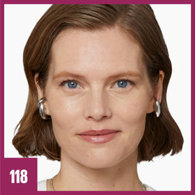 Maybelline foundation texture on fingertip showing creamy, hydrating finish