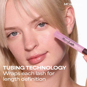 MCoBeauty wand close-up demonstrating precision tapered brush for even coating