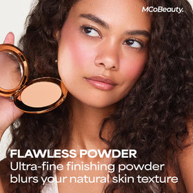 MCoBeauty compact open with mirror illustrating travel-ready touch up convenience
