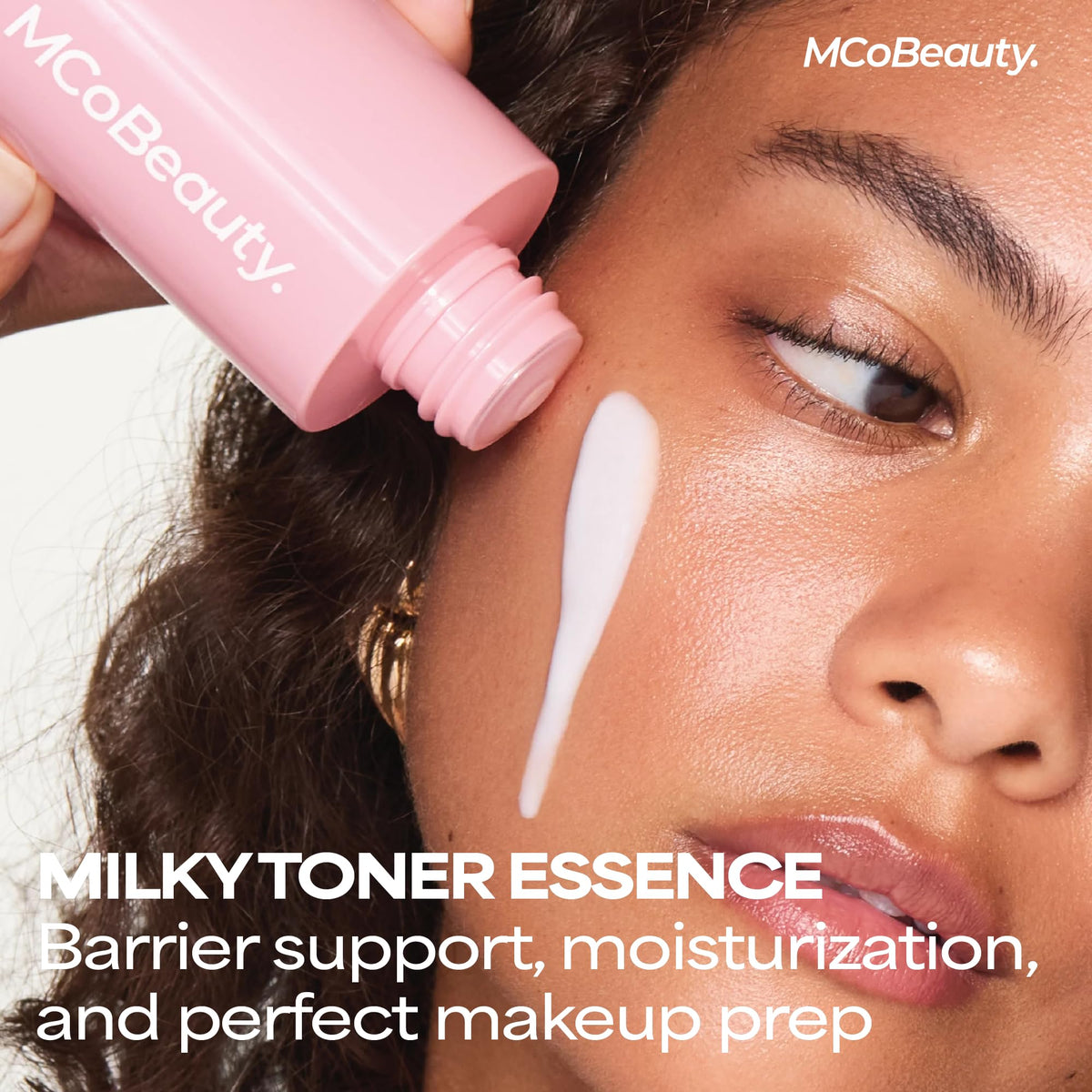 MCoBeauty milky toner texture poured onto hand for hydration