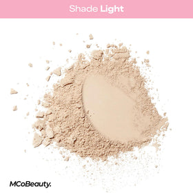 MCoBeauty powder applied with brush demonstrating matte natural finish benefit