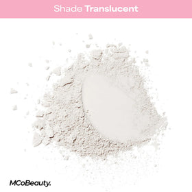 MCoBeauty powder on skin swatch displaying translucent, no-white-cast finish and natural look