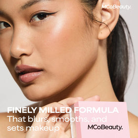 MCoBeauty pressing powder with puff to lock concealer and extend wear