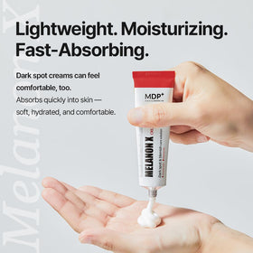 MDP Melanon X Cream next to a 30g comparison showing compact travel-friendly benefit