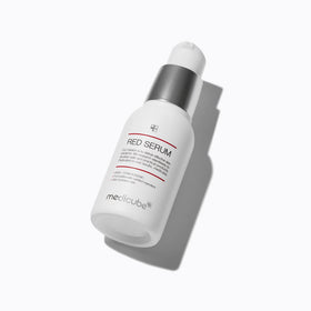 Medicube Red Serum 2.0 droplet on skin showing quick absorption benefit