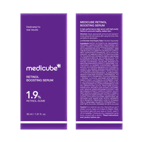 medicube bottle staged by bedside lamp suggesting recommended nighttime use