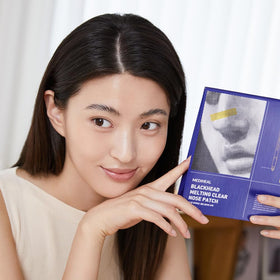 MEDIHEAL close-up of patch texture highlighting ampoule-soaked three-layer sheet benefit
