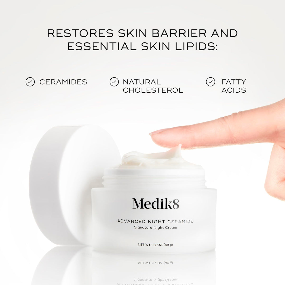 Medik8 product on fingertip ready to apply for targeted under-eye benefit