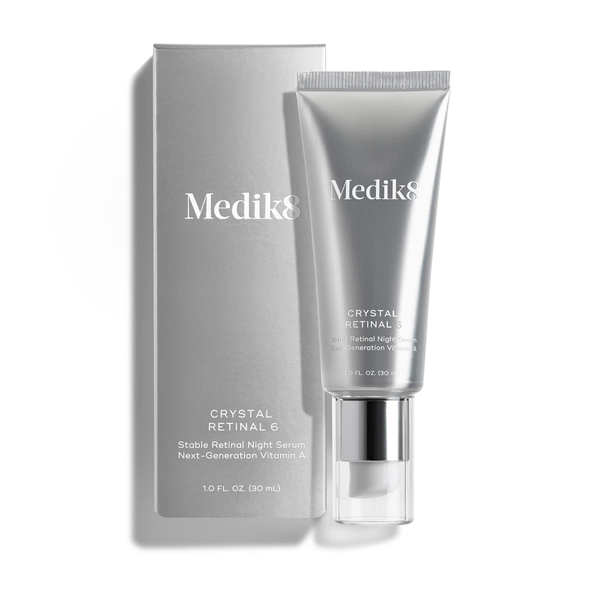 Medik8 1 oz bottle next to coin showing clear size and travel-friendly benefit