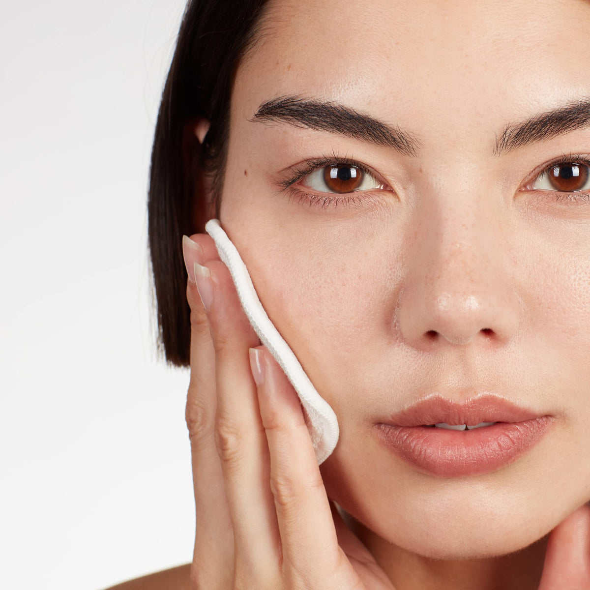 Medik8 Press and Clear in a bathroom routine setting promoting clearer skin benefit