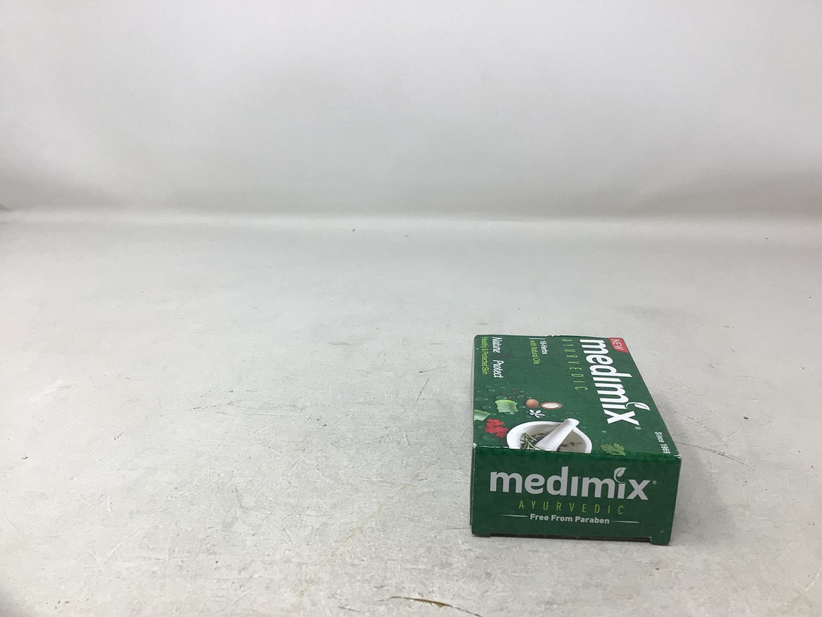 Medimix single bar close-up showing handmade texture and visible botanical flecks for natural appeal