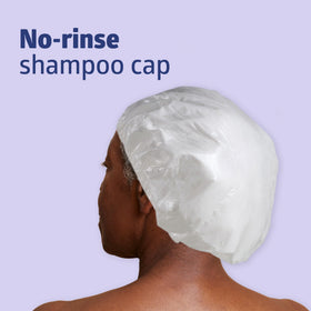 Medline ReadyBath cap close-up showing moist texture and wipe-clean action