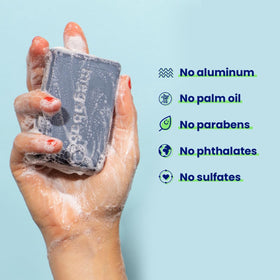 Megababe Space Bar applied underarm in shower, demonstrates odor control prep