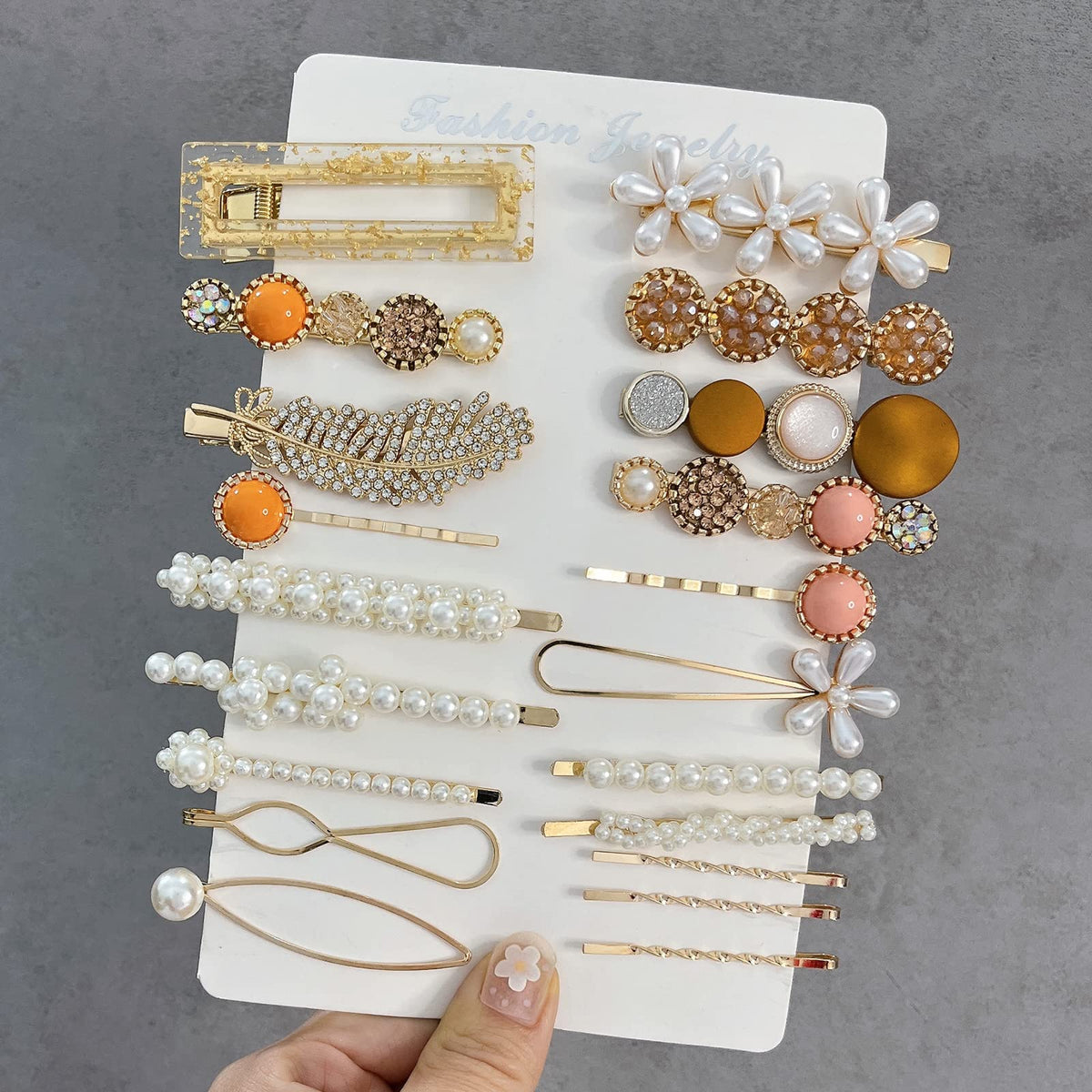 Mehayi close-up on acrylic barrette texture highlighting glossy finish and durability