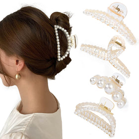 Mehayi front view of four pearl claw clips shows elegant styling and firm hold