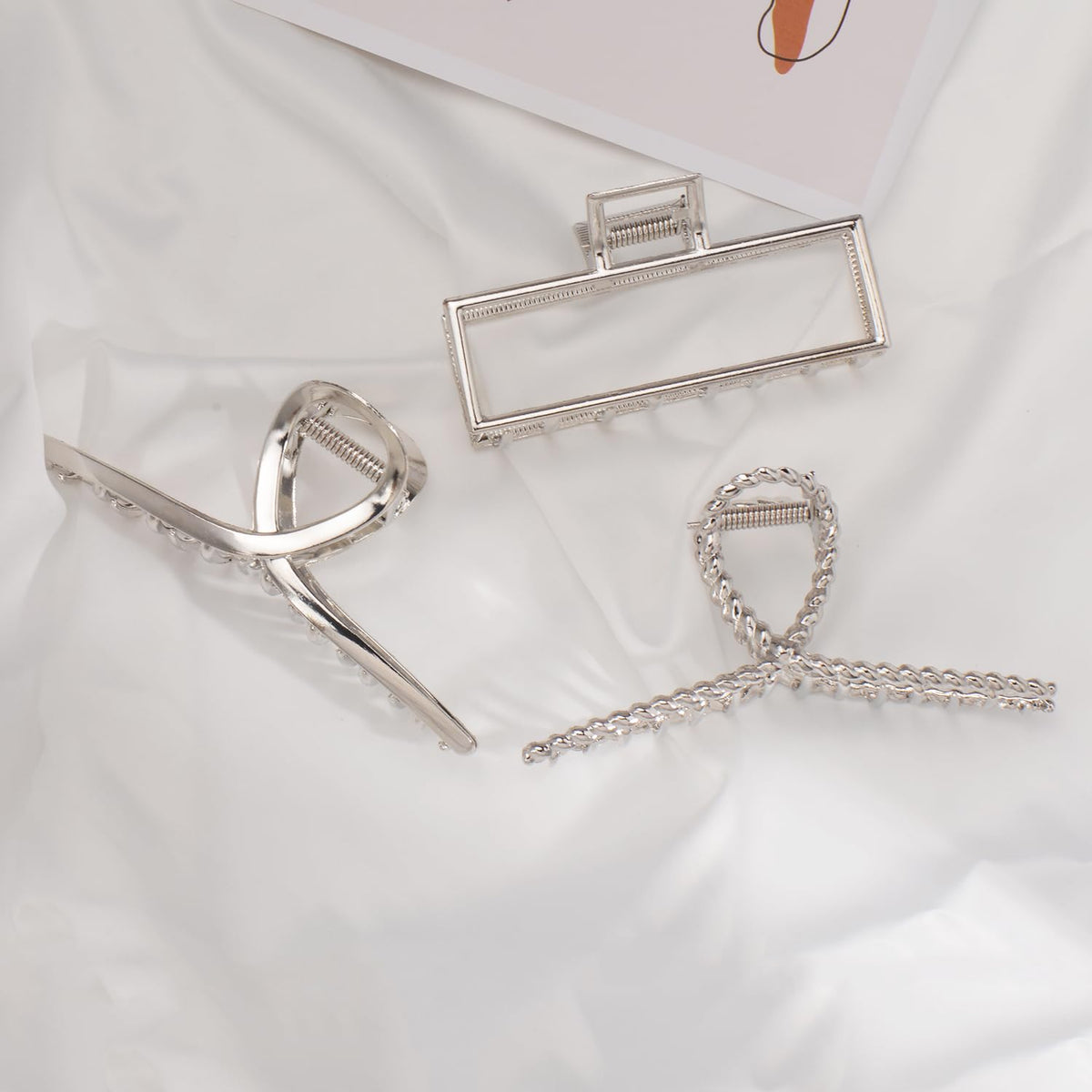 Mehayi clip in use holding a bun, comfortable all-day secure styling