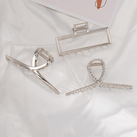 Mehayi clip in use holding a bun, comfortable all-day secure styling