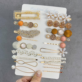 Mehayi pearl clip detail showing imitation pearls and elegance