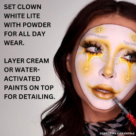 Mehron Clown White Lite 2 oz tin beside a coin for size comparison and portability