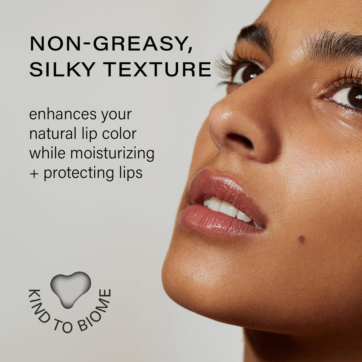Melixir lip butter held in hand to show size and travel-friendly convenience benefit