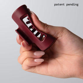 MELLO close-up of inward-curving teeth reducing scalp pressure