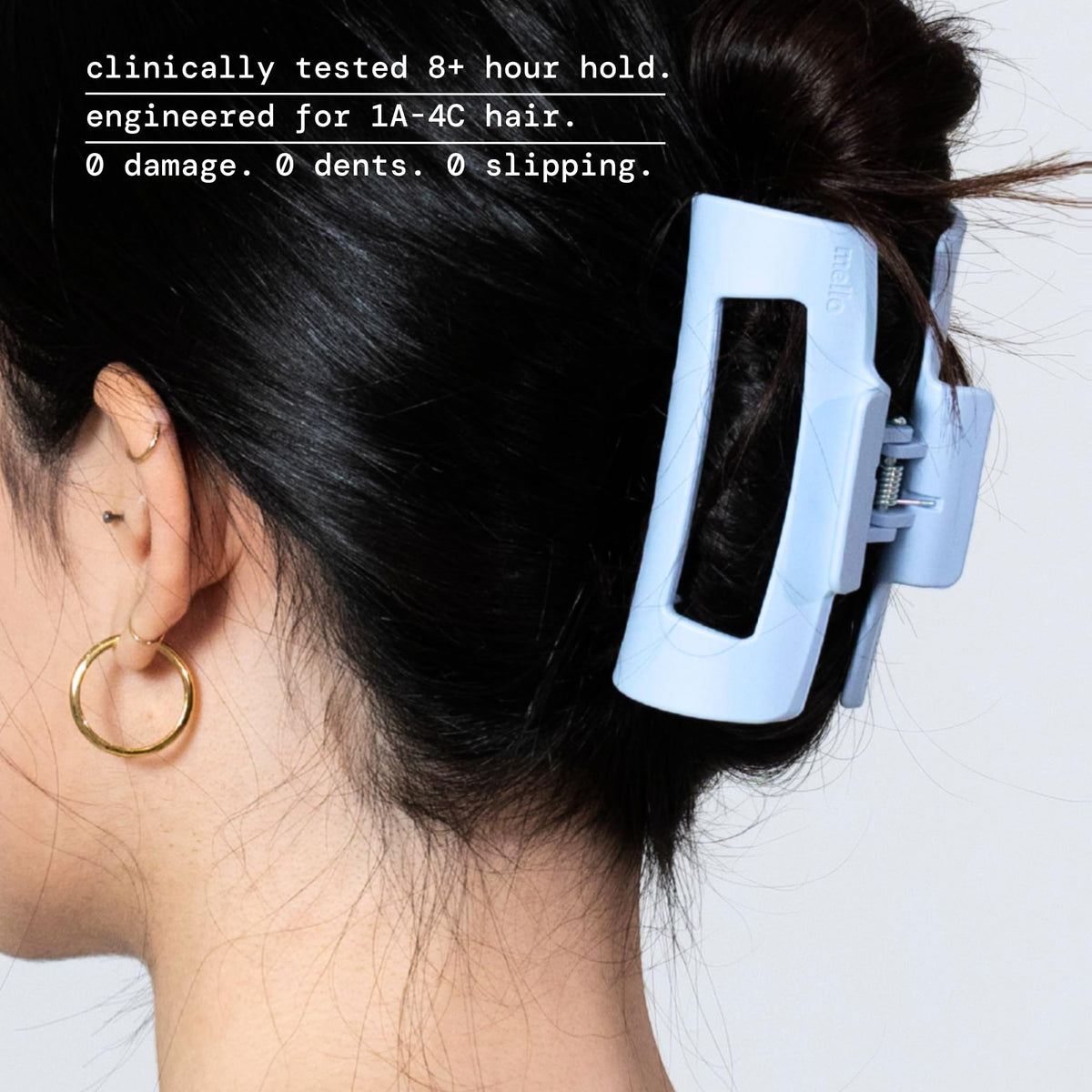 MELLO clip flexed flat against headrest showing compression benefit