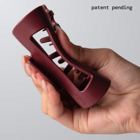 MELLO close-up of inward-curving teeth reducing scalp pressure
