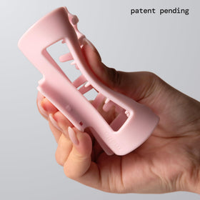 MELLO close-up of inward-curving teeth preventing scalp pressure