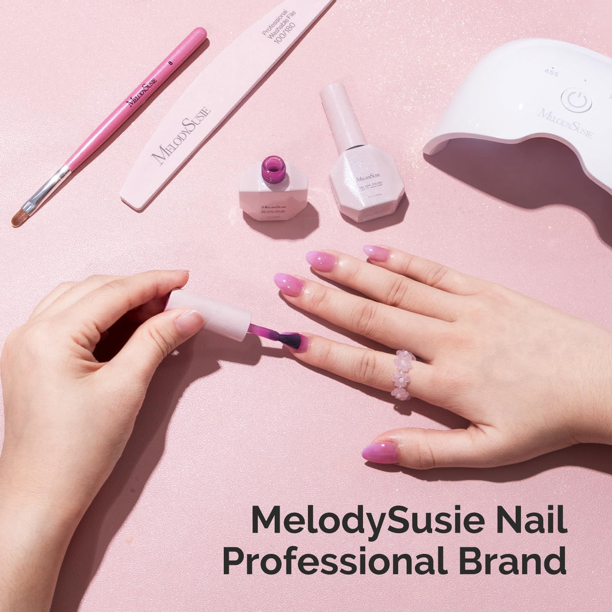 MelodySusie lifestyle shot of soft tint nails demonstrating everyday elegant look