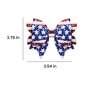 melyde bow next to ruler indicating 3.5-inch size for scale
