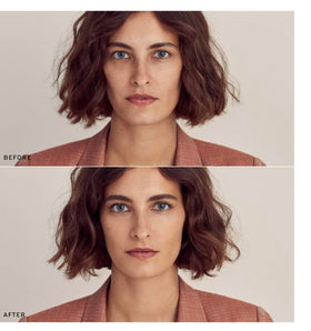 MERIT product in use applying to cheek for precise coverage and natural finish