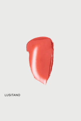 MERIT Flush Balm Lusitano blended on cheek close-up showing natural radiant finish