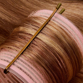 MetaGrip pins arranged in salon kit for organized, fast access