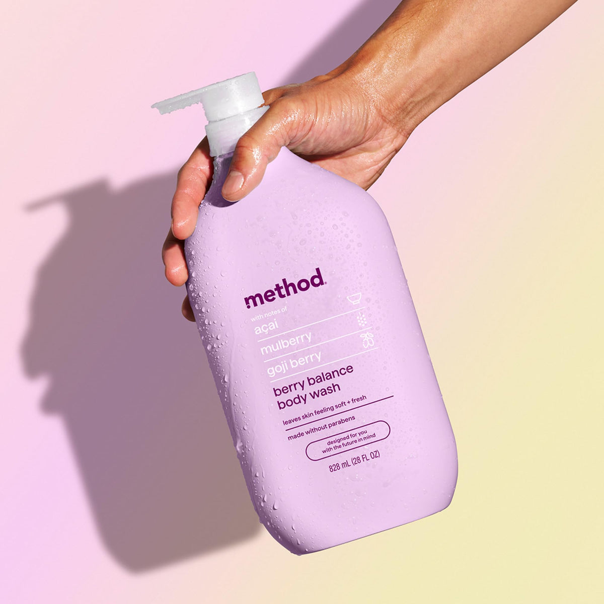 Method bottle in shower scene conveying fresh berry scent and relaxation