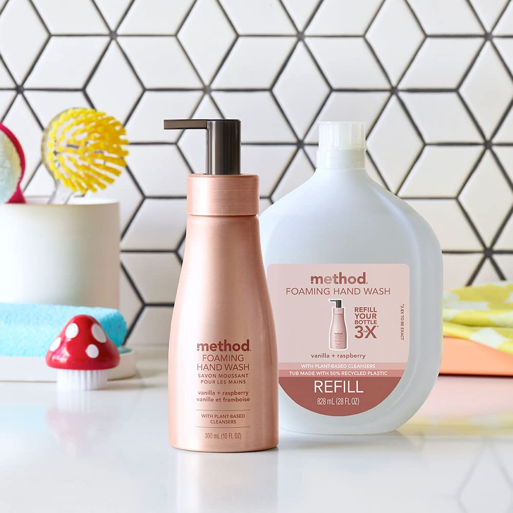 Method bottle held in hand for scale showing compact 10 fl oz size and convenience