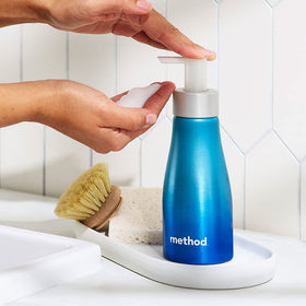 Method Sea Minerals bottles staged in bathroom showing reduced-plastic sustainable choice