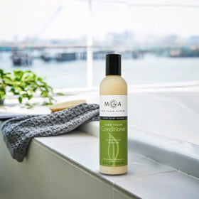 Max Green Alchemy results on curly hair showing defined, frizz-controlled finish