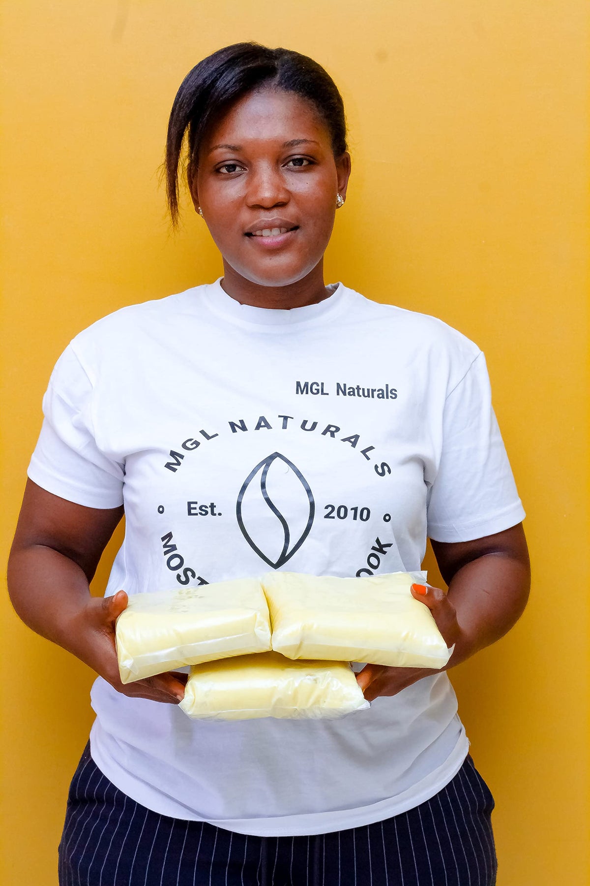 MGL Naturals ingredient label detailing 100% pure shea butter contents