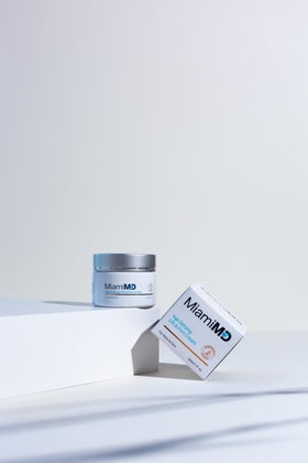 MiamiMD 1.7oz jar beside a coin to show true size and travel-friendly benefit
