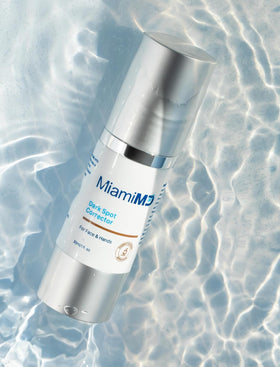 MiamiMD applying serum to hands showing targeted spot treatment benefit