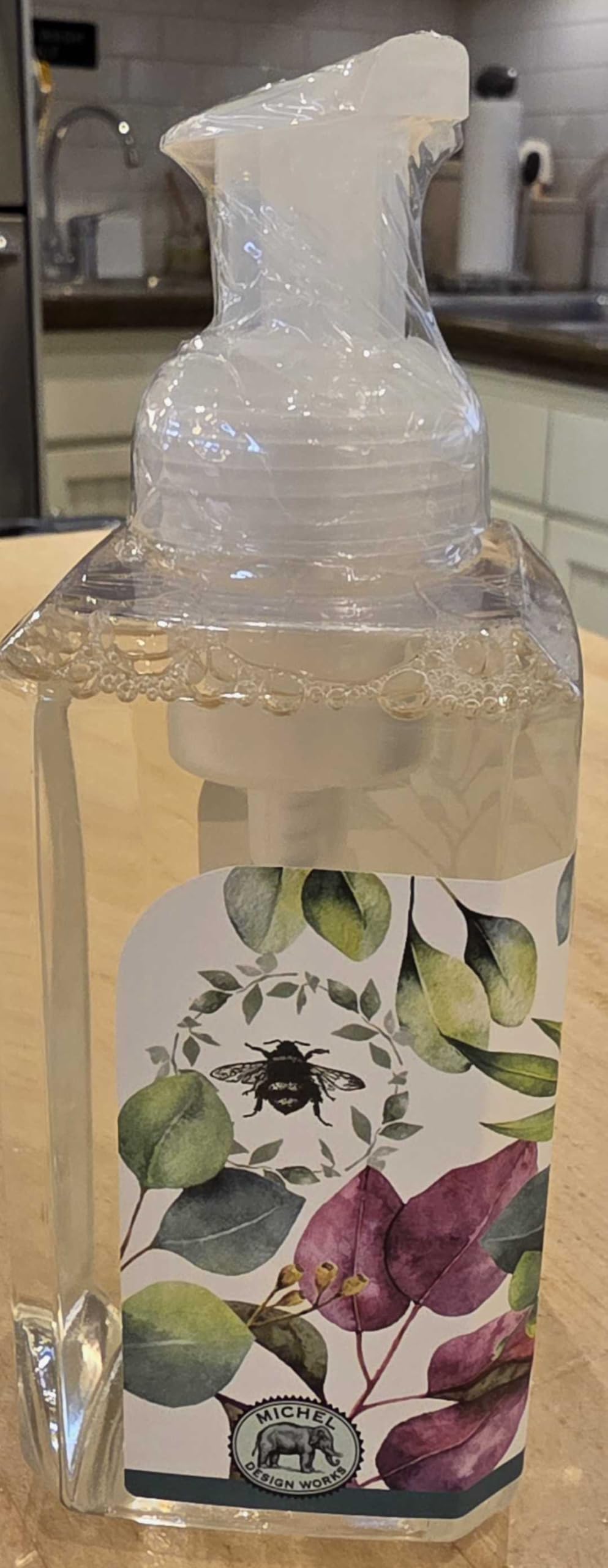 Michel Design Works bottle staged on bathroom vanity for decorative coordinated display