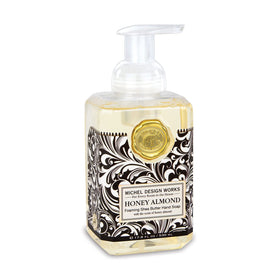 Michel Design Works front view of honey almond foaming hand soap showing elegant dispenser and medallion