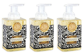 Michel Design Works front bottle view showing elegant square dispenser and medallion, stylish presentation