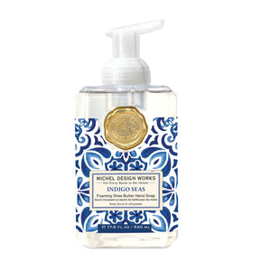 Michel Design Works front dispenser showing elegant square bottle and medallion benefit display