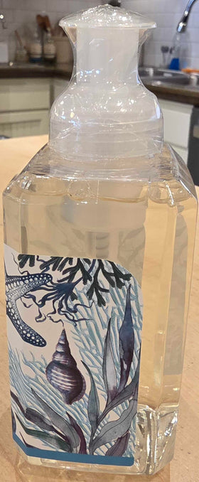 Michel Design Works bottle styled in bathroom setting adding coastal scent and decorative appeal