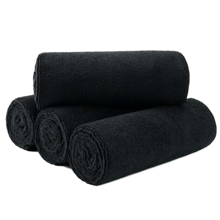 MICROFI front pack showing four black 16x29 towels, professional convenience