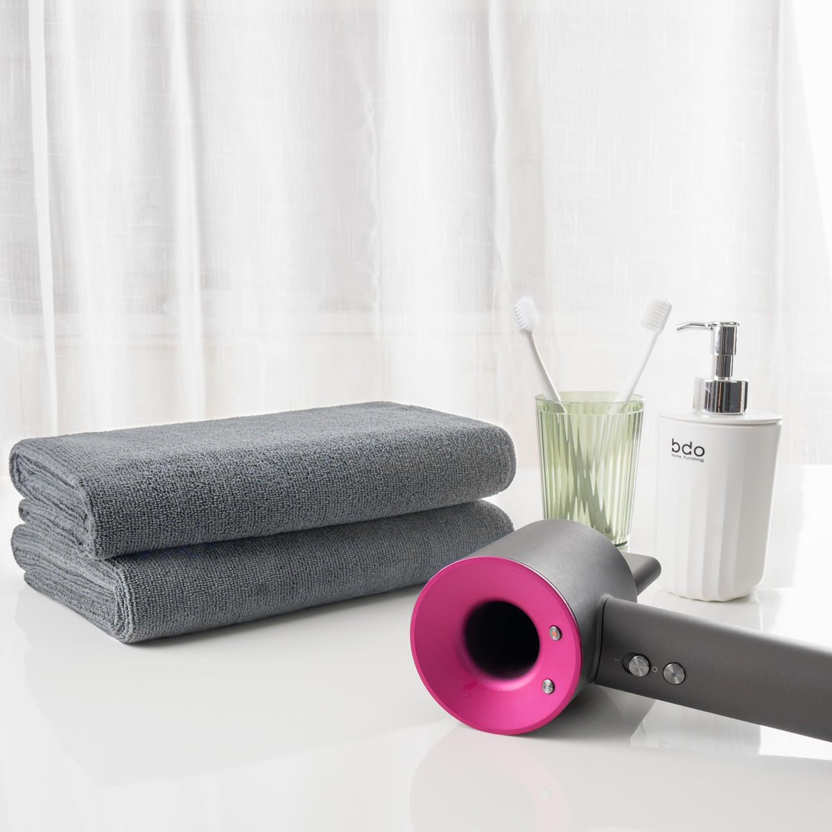 MICROFI towel beside ruler showing generous size for all hair lengths