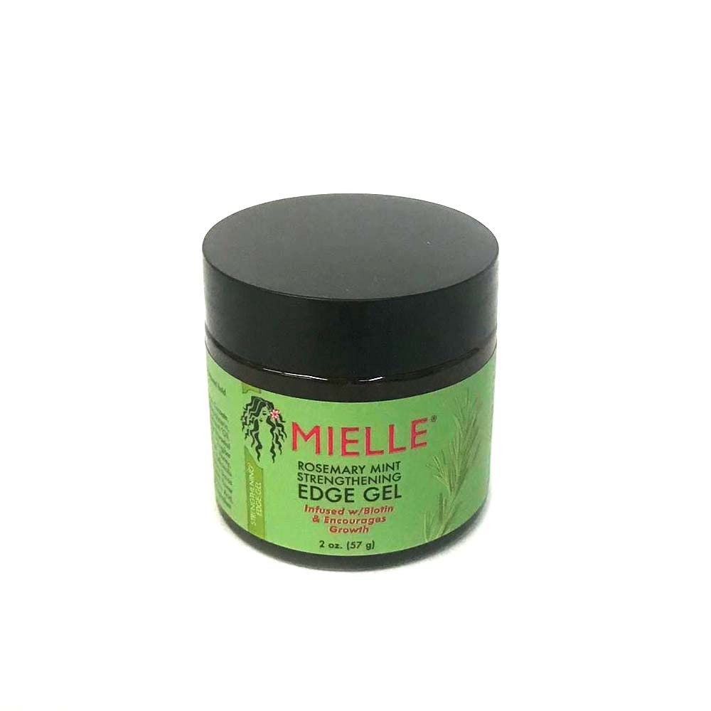 Mielle Organics edge gel applied to hairline for sleek edges and long-lasting control