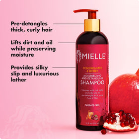Mielle Organics bottle styled with curly hair backdrop illustrating intended use