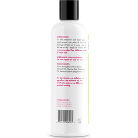 Mielle Organics oil pouring drop close-up highlighting lightweight texture